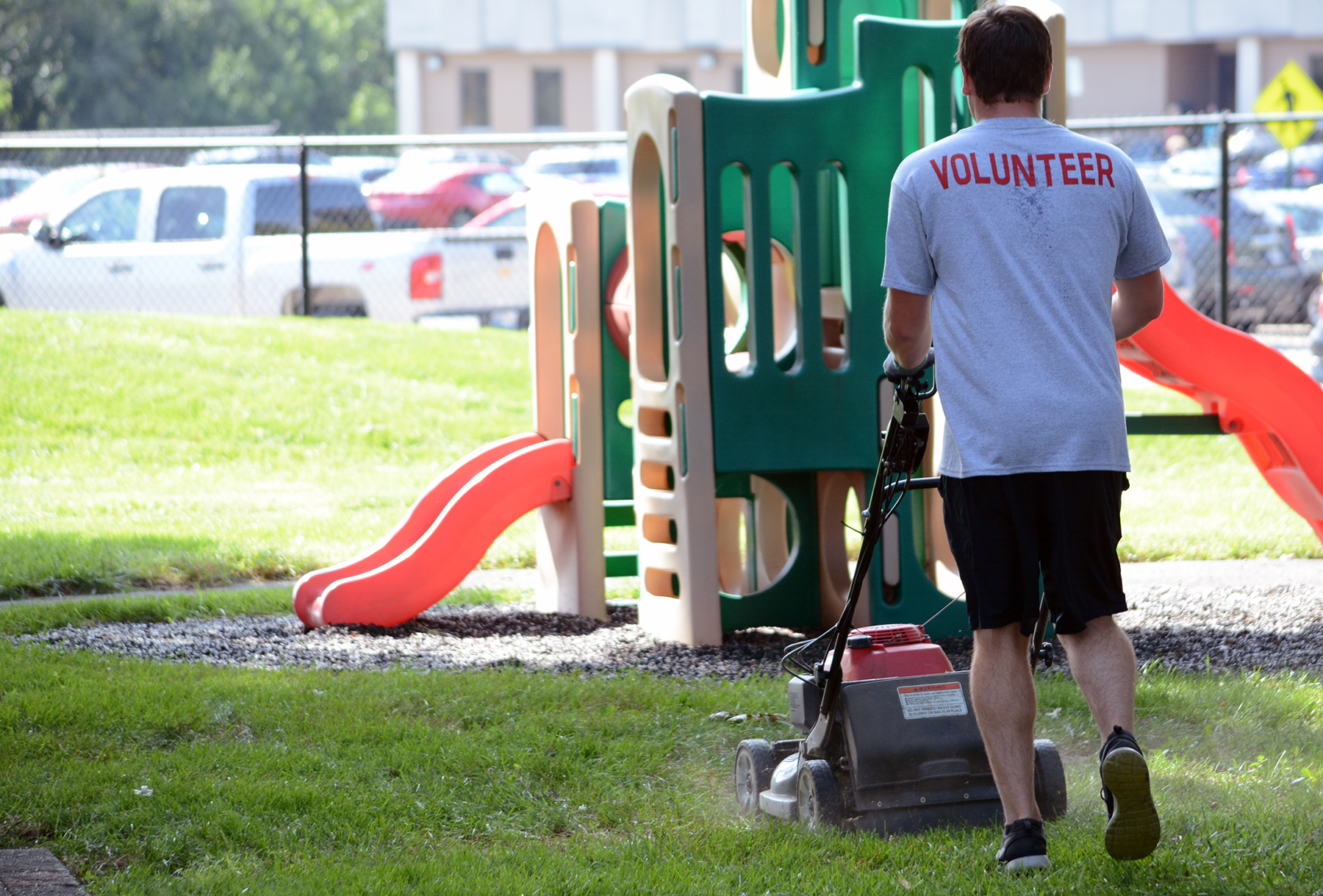 volunteer working in playground